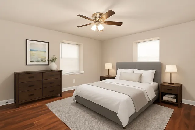 a bedroom with a bed and a dresser