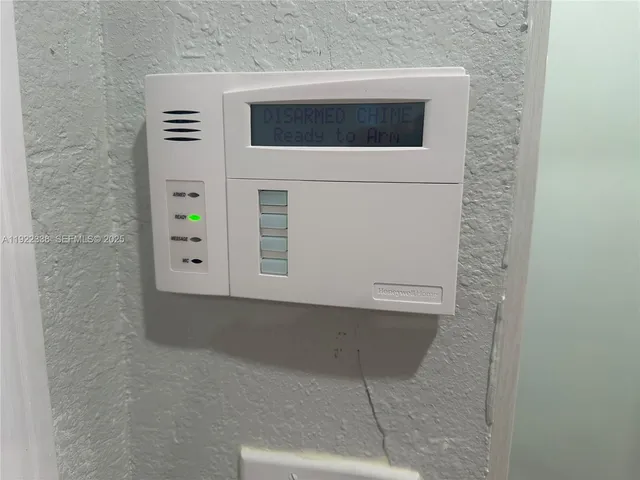 a bathroom with a sink and a microwave