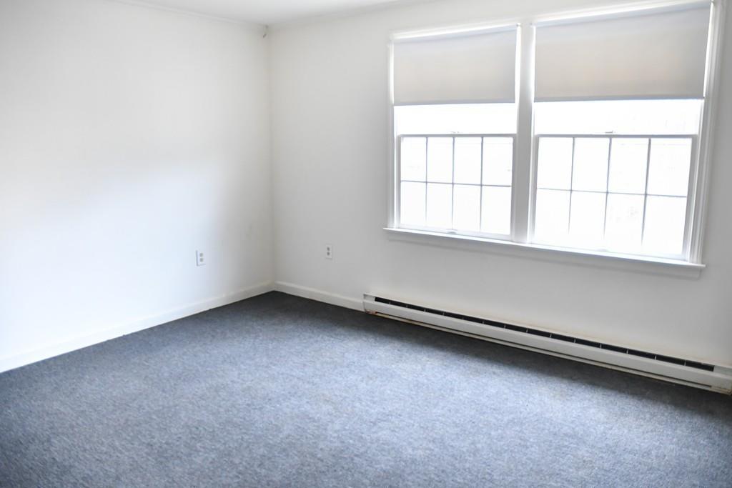 45 Powder Mill Road Sudbury, MA 01776 - Photo 11 of 20 an empty room with a window