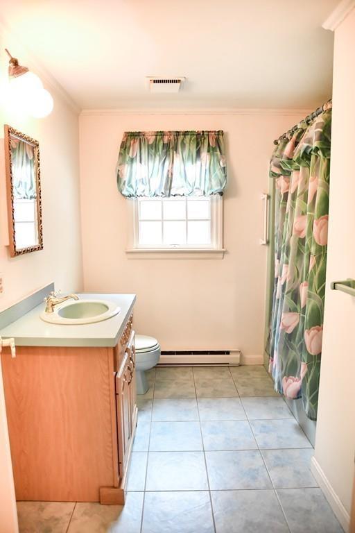 45 Powder Mill Road Sudbury, MA 01776 - Photo 13 of 20 a view of a room with window and chandelier