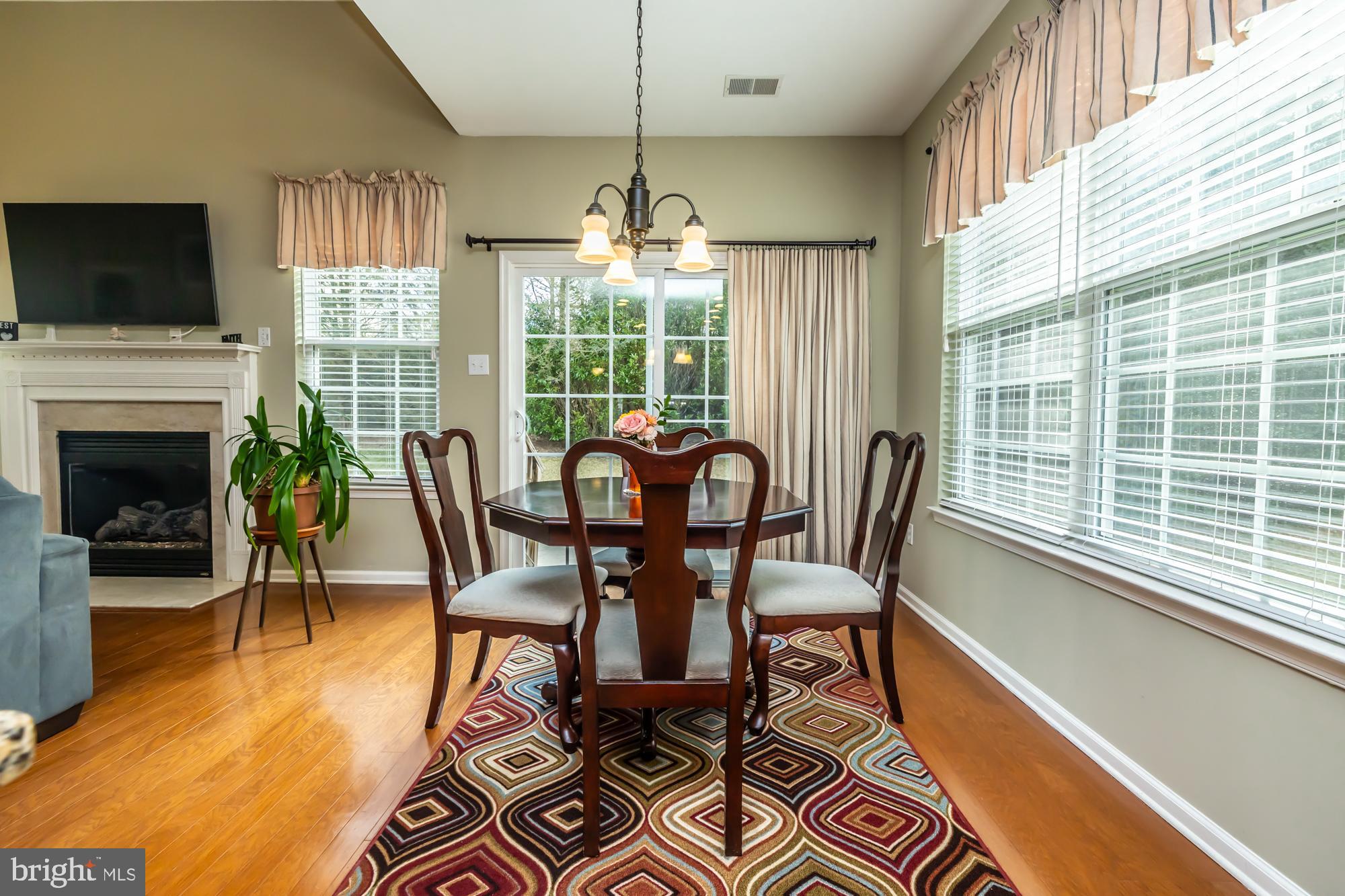 141 Stoyer Road Coatesville, PA 19320 - Photo 16 of 40 a dining room with furniture a chandelier and wooden floor