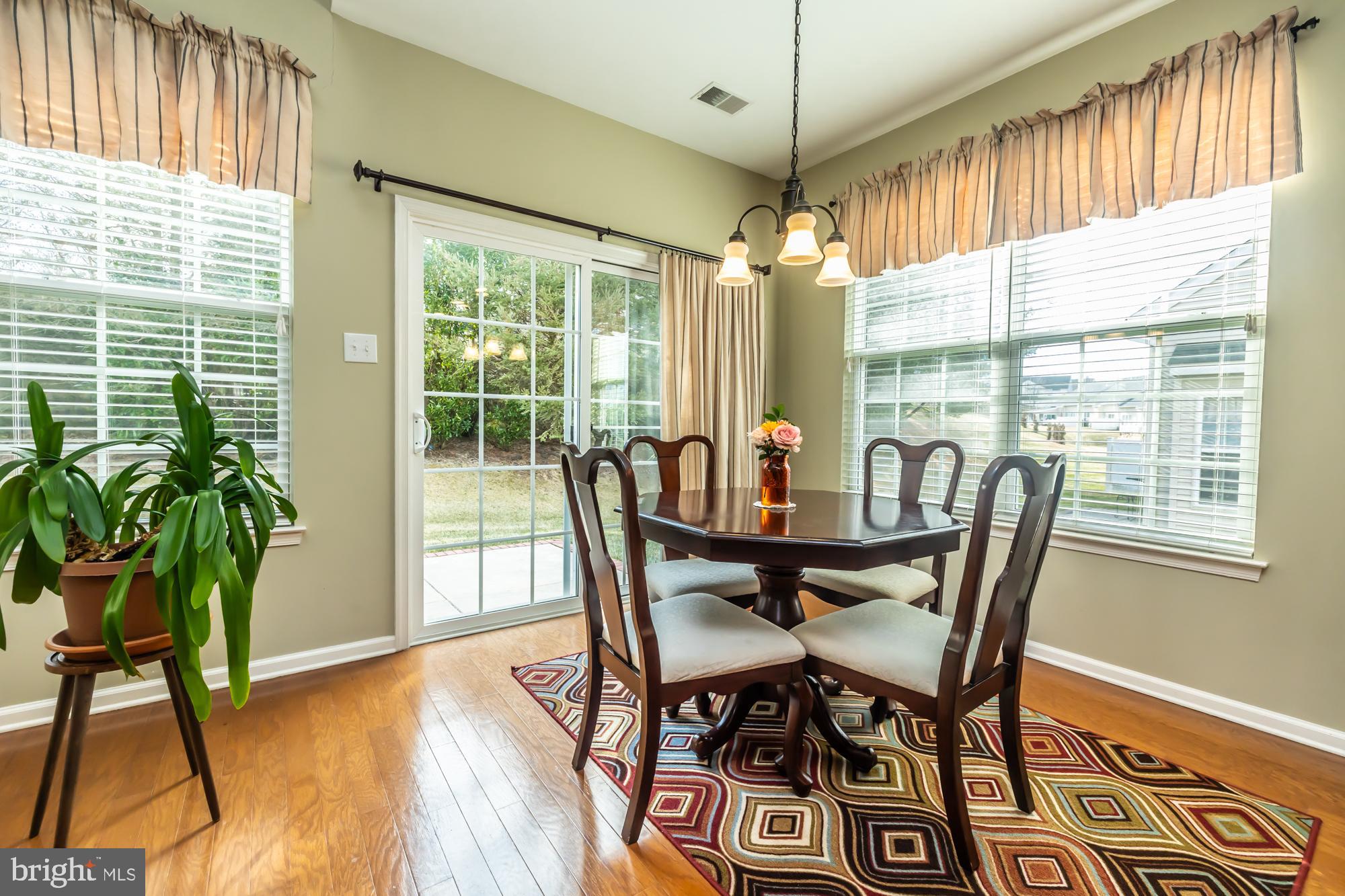 141 Stoyer Road Coatesville, PA 19320 - Photo 17 of 40 a view of a dining room with furniture window and wooden floor