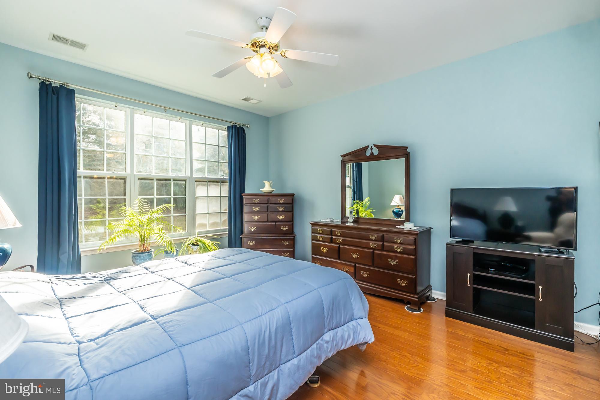 141 Stoyer Road Coatesville, PA 19320 - Photo 23 of 40 a bedroom with a bed and a flat screen tv