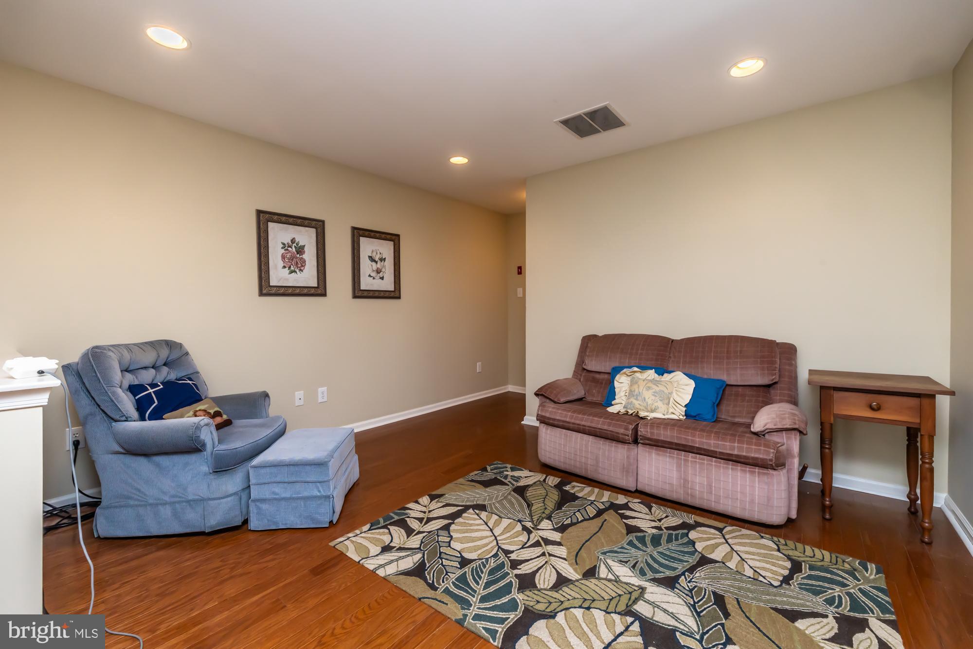 141 Stoyer Road Coatesville, PA 19320 - Photo 31 of 40 a living room with furniture and wooden floor