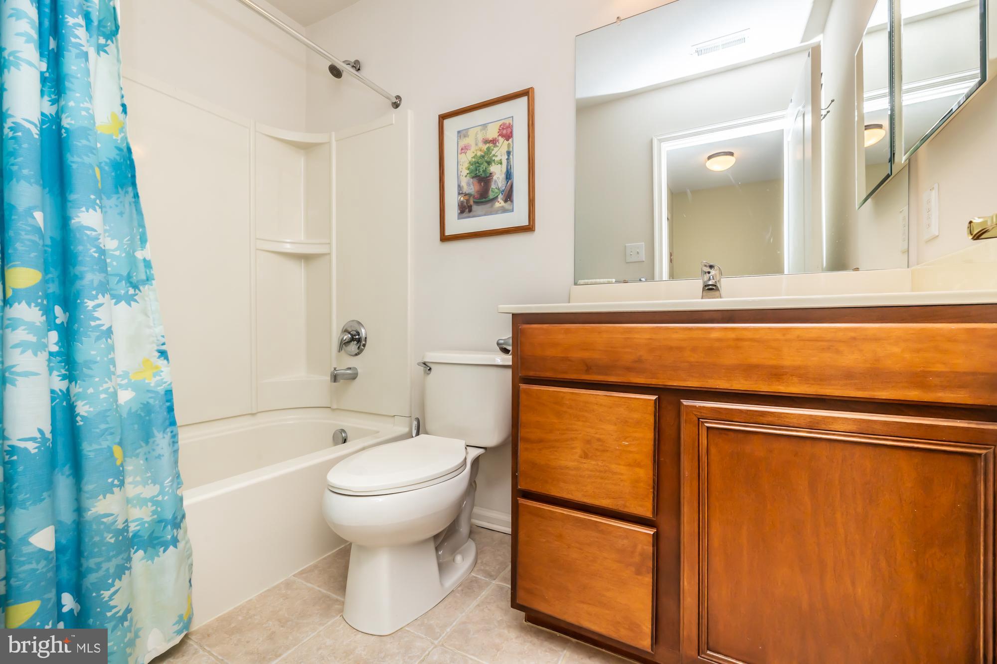 141 Stoyer Road Coatesville, PA 19320 - Photo 33 of 40 a bathroom with a sink a toilet and shower