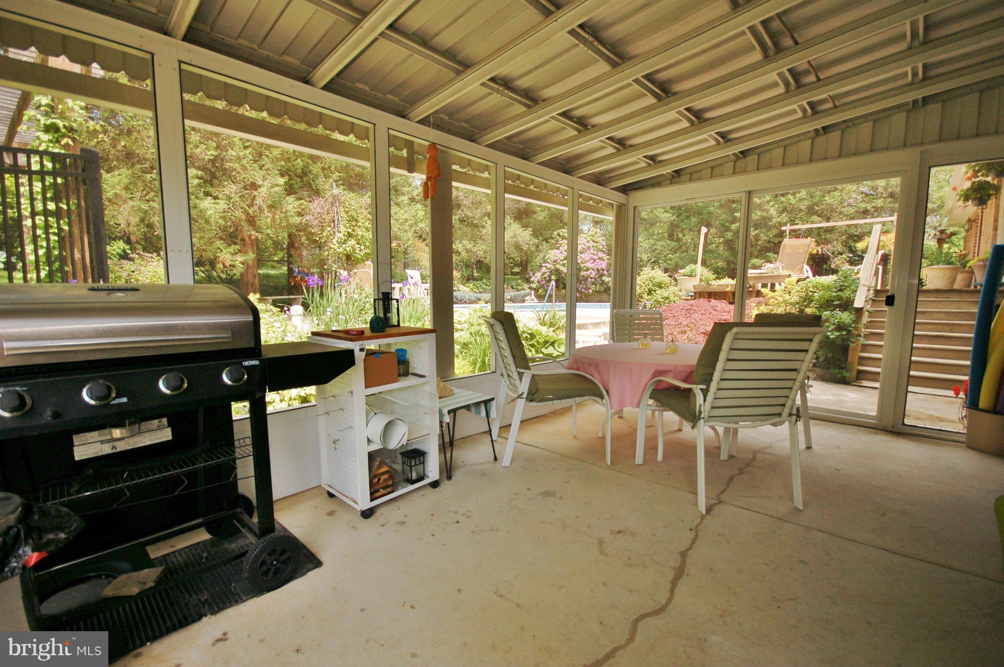 19104 Olney Mill Road Olney, MD 20832 - Photo 23 of 28 Screened porch off lower level master