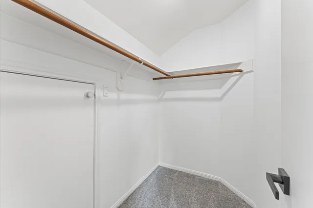 a view of small space with racks on the wall