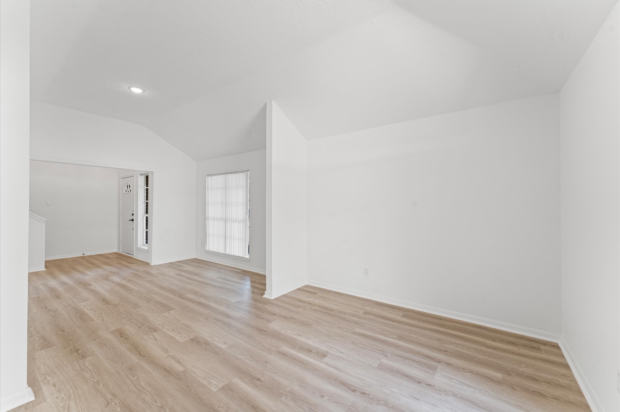 17527 Hamilwood Drive Cypress, TX 77433 - Photo 8 of 32 a view of empty room with wooden floor
