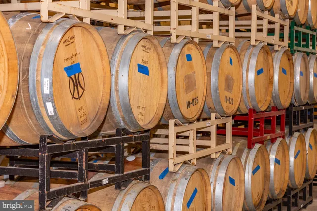 a kitchen with stainless steel appliances a stove and more cabinets