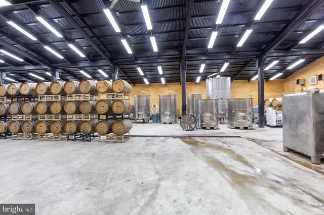 a view of a chairs and table in the balcony