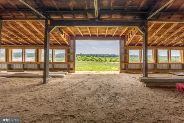 a view of yard with swimming pool and green space