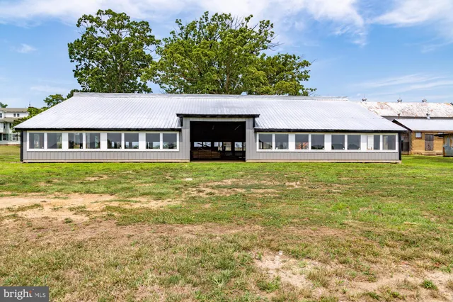 a view of parking garage with cars and other equipment