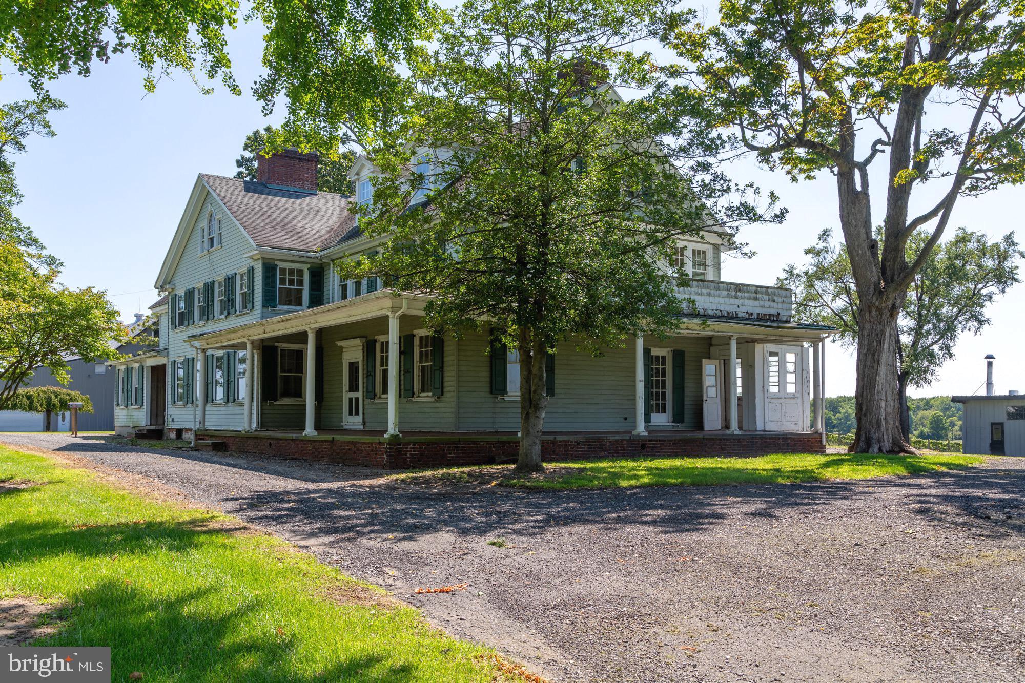 27058 Mt Pleasant Road Columbus, NJ 08022 - Photo 50 of 127 a front view of a house with garden