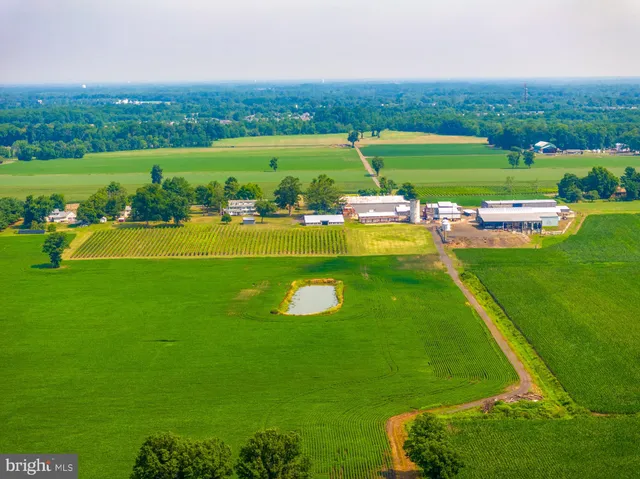 a view of an empty room with a car parked in it