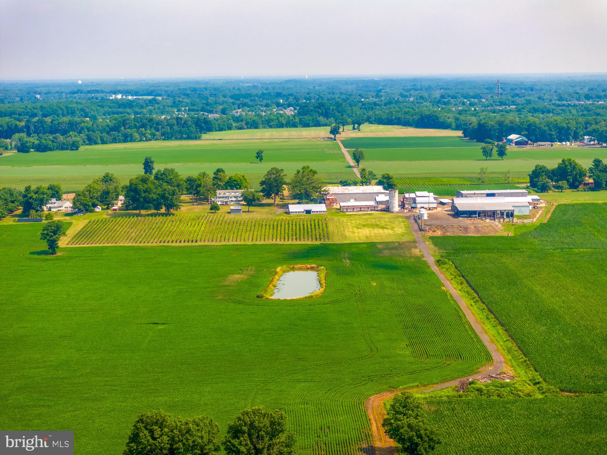 27058 Mt Pleasant Road Columbus, NJ 08022 - Photo 6 of 127 an aerial view of a city with lots of green space