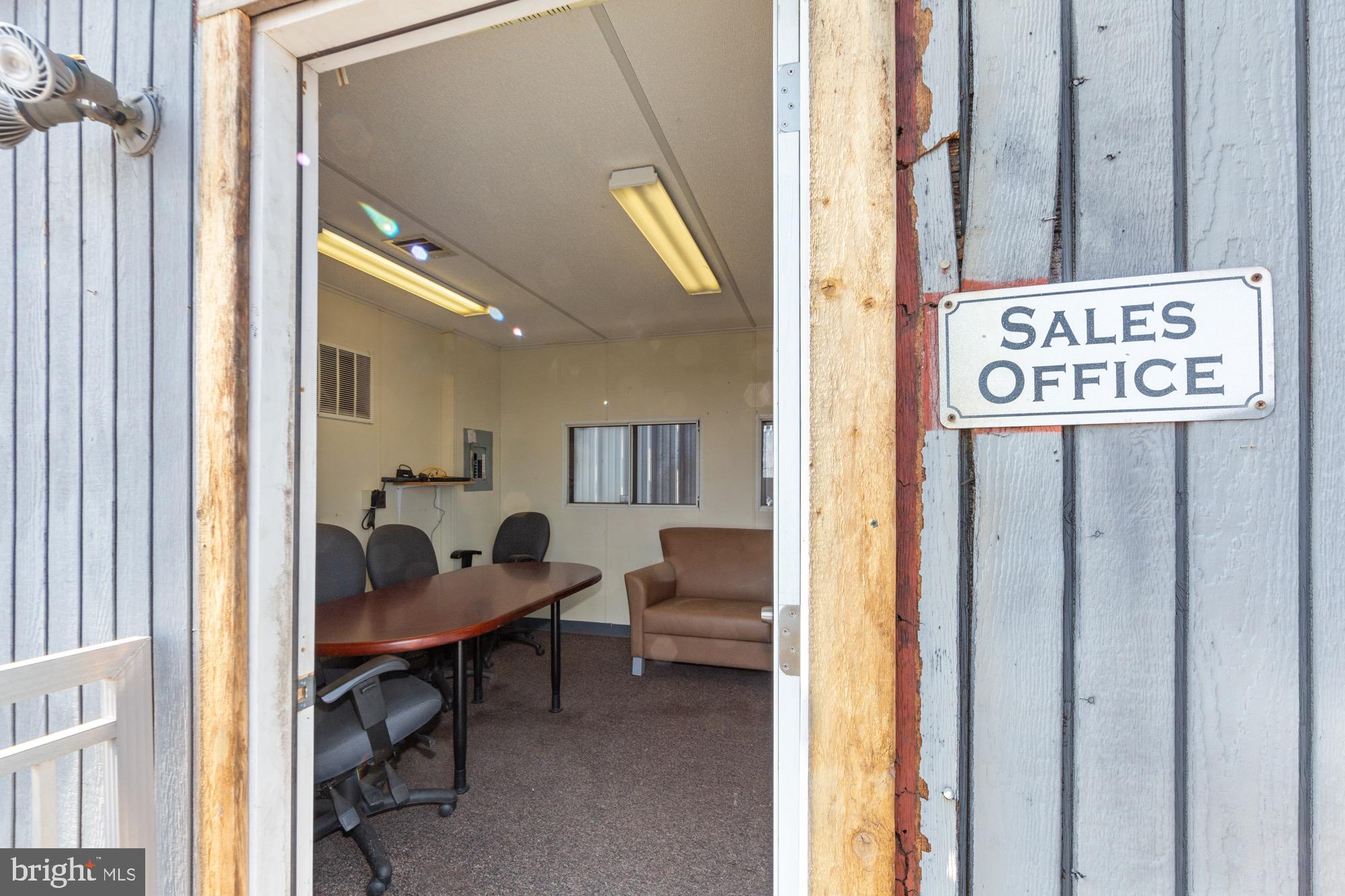 27058 Mt Pleasant Road Columbus, NJ 08022 - Photo 83 of 127 a view of a hallway to a livingroom with furniture and a window