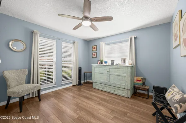 a room with furniture and a window