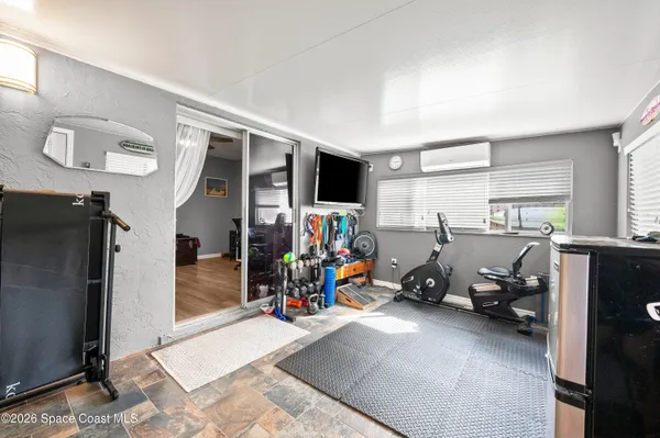 a view of a room with gym equipment
