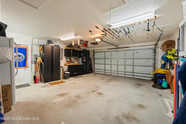 a view of a garage with storage