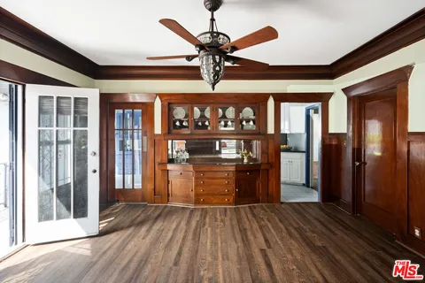 a kitchen with stainless steel appliances granite countertop a stove and a refrigerator