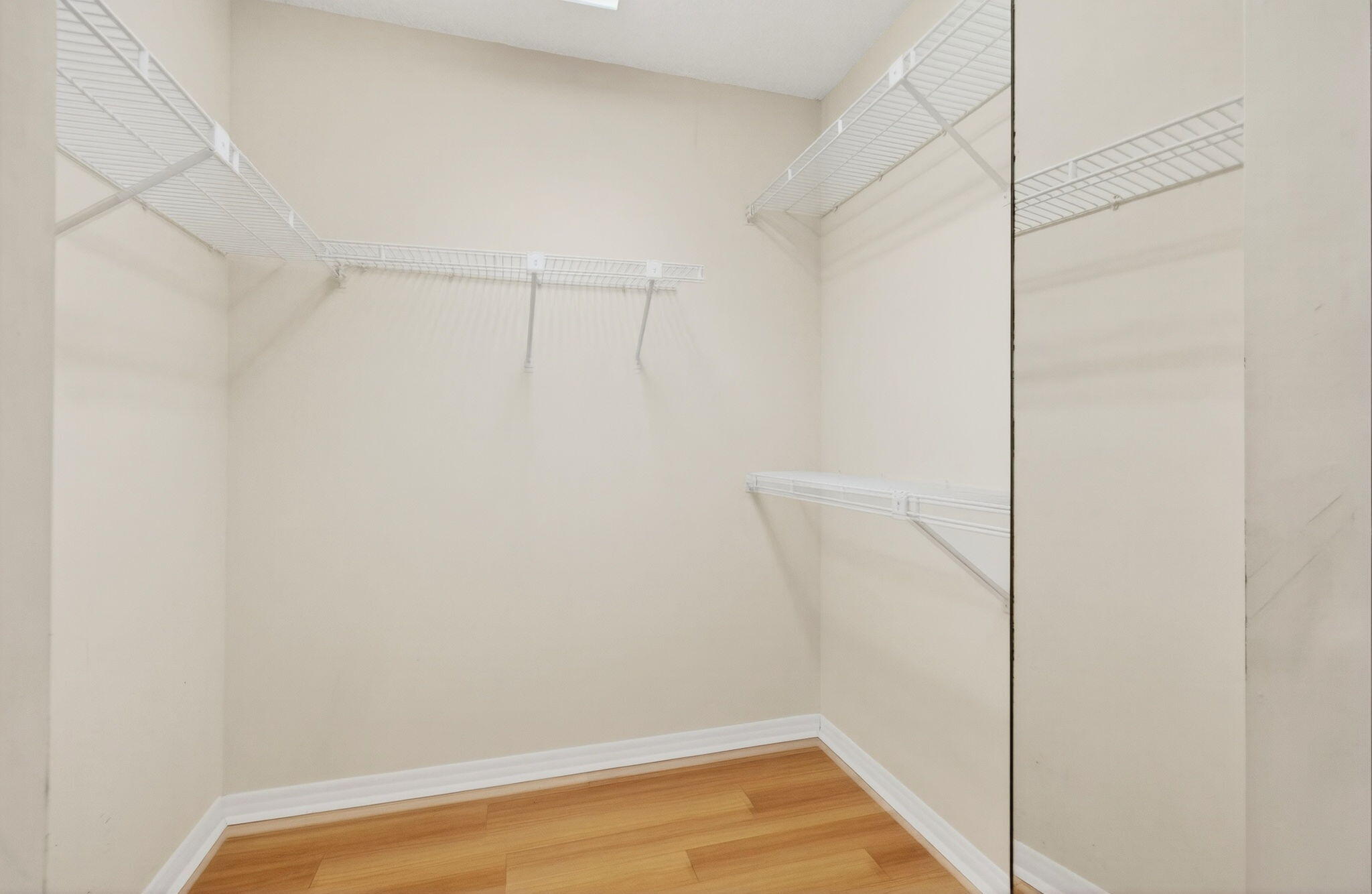 1501 Cayman Way, Unit C4 Coconut Creek, FL 33066 - Photo 32 of 67 Primary Suite Walk-In Closet
