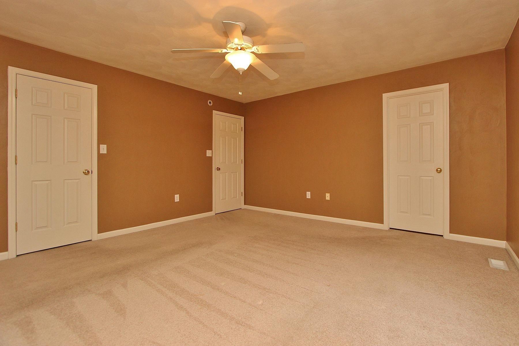 4239 Daugherty Road Salem, VA 24153 - Photo 12 of 38 a view of a livingroom with a chandelier fan
