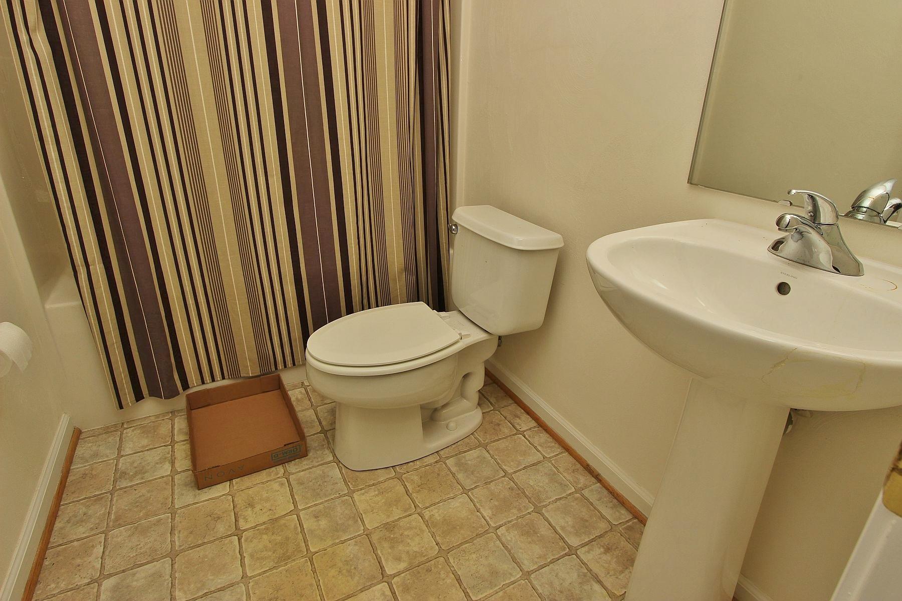 4239 Daugherty Road Salem, VA 24153 - Photo 31 of 38 a bathroom with a sink and a toilet