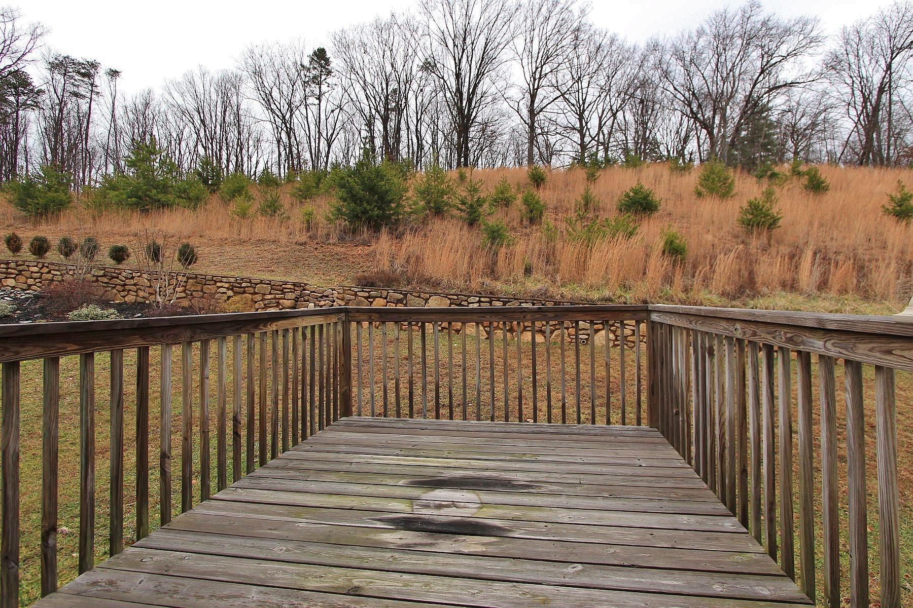 4239 Daugherty Road Salem, VA 24153 - Photo 32 of 38 a view of wooden balcony with lake