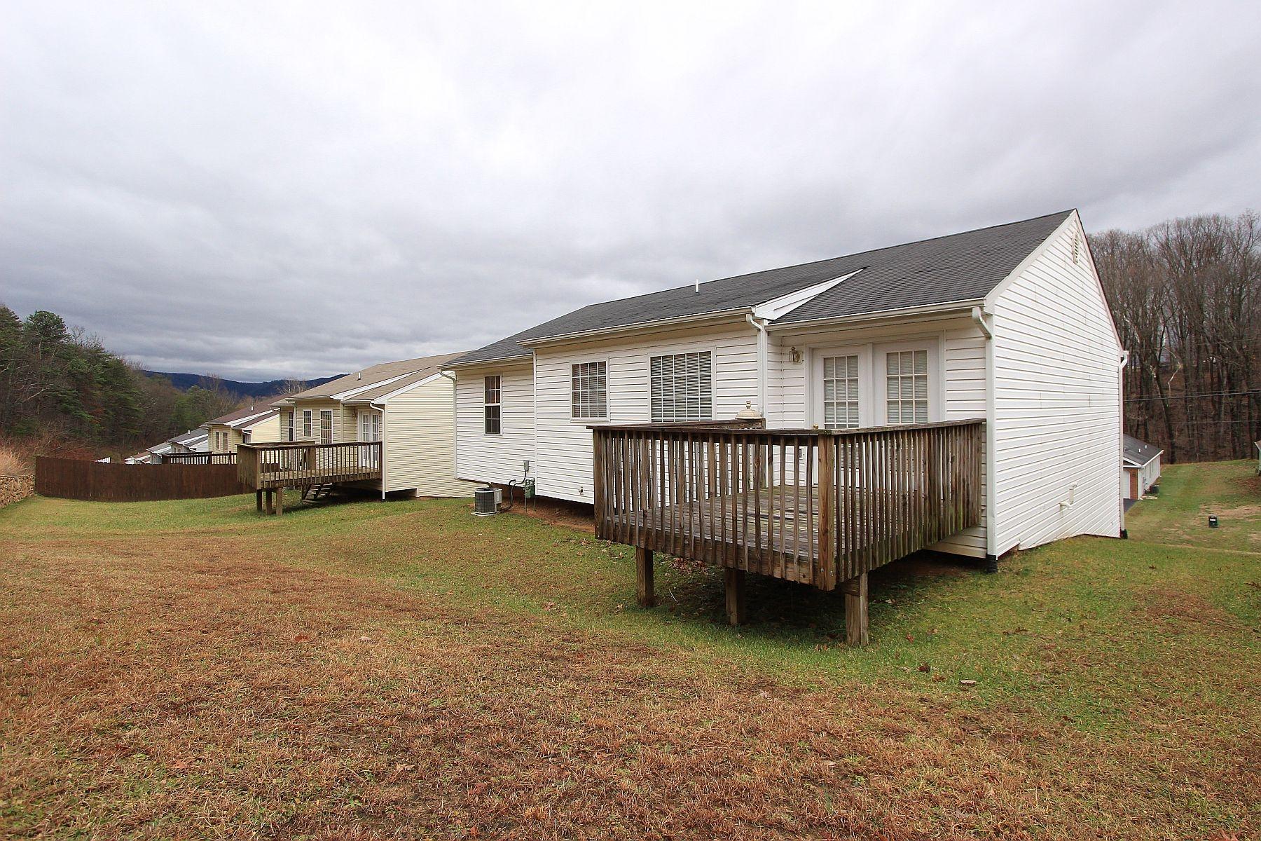 4239 Daugherty Road Salem, VA 24153 - Photo 35 of 38 a view of a house with a backyard and deck