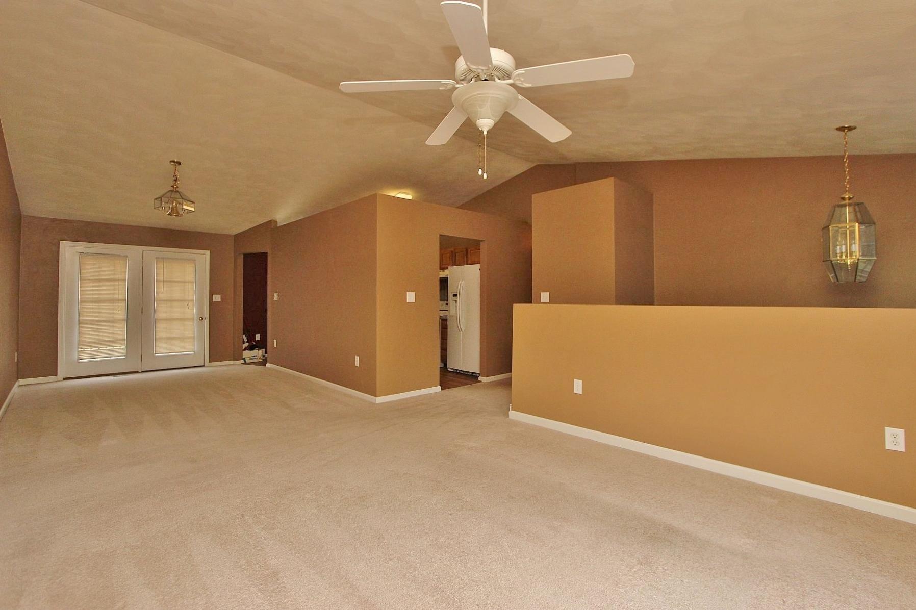 4239 Daugherty Road Salem, VA 24153 - Photo 5 of 38 a view of an empty room with a ceiling fan