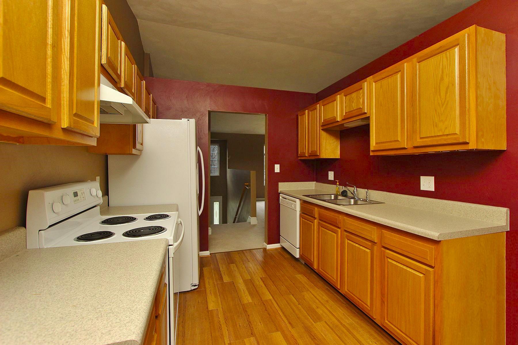 4239 Daugherty Road Salem, VA 24153 - Photo 7 of 38 a kitchen with stainless steel appliances a stove a sink and a refrigerator