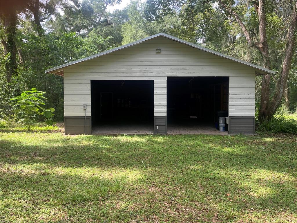 3023 Southeast 13th Place Gainesville, FL 32641 - Photo 26 of 29 a backyard of a house