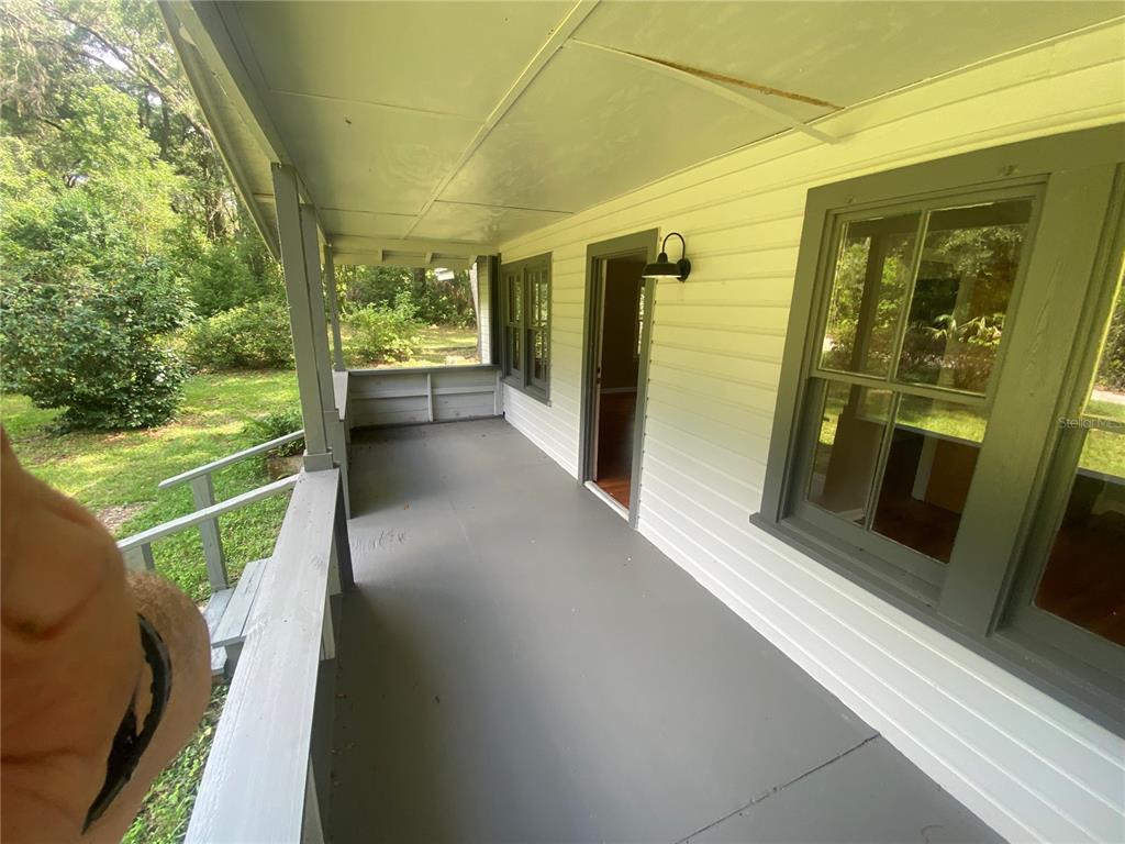 3023 Southeast 13th Place Gainesville, FL 32641 - Photo 8 of 29 a view of a porch