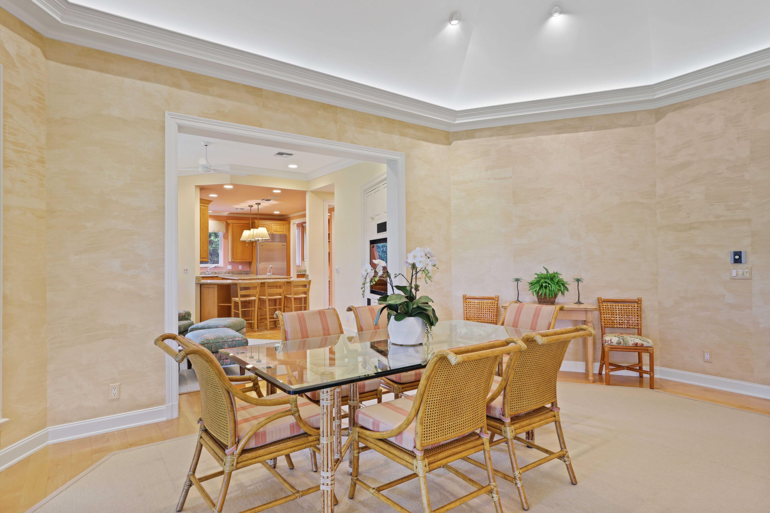 5 Country Road East, Unit A Boynton Beach, FL 33436 - Photo 12 of 51 a dining room with furniture and window