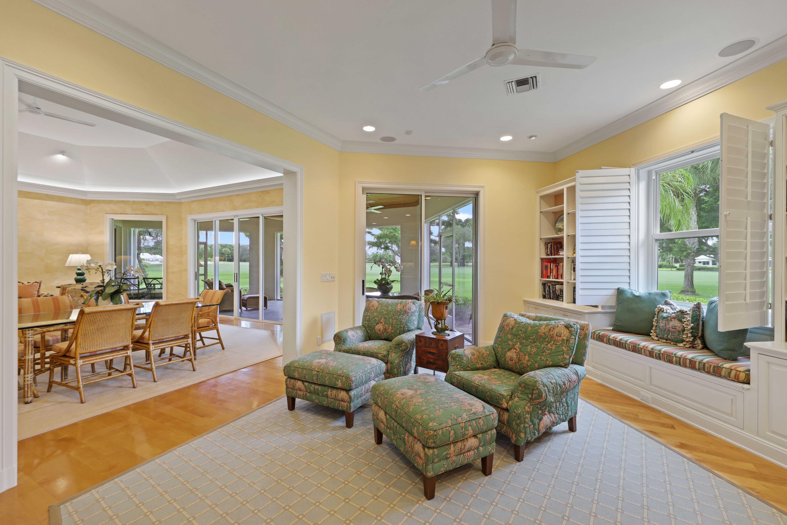 5 Country Road East, Unit A Boynton Beach, FL 33436 - Photo 13 of 51 a living room with furniture and large windows