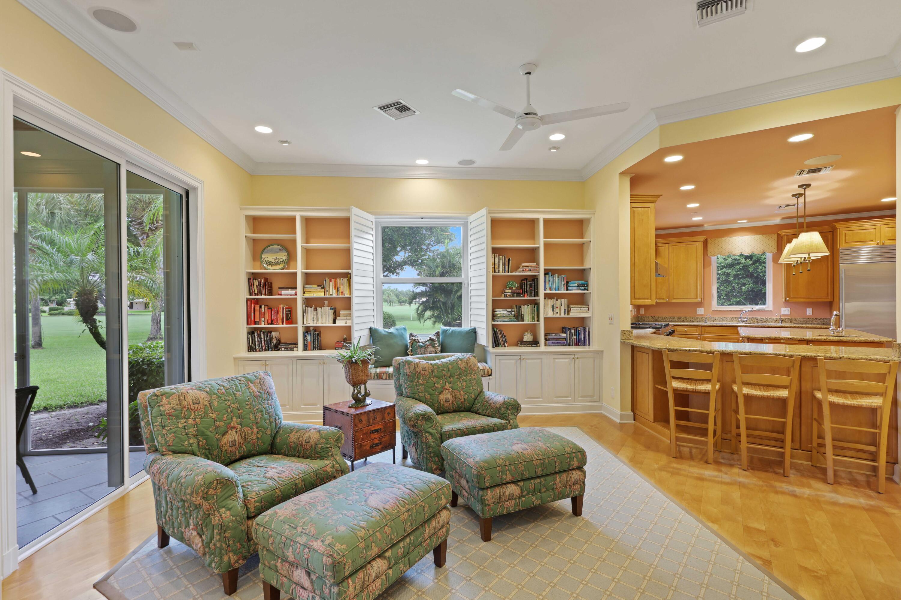 5 Country Road East, Unit A Boynton Beach, FL 33436 - Photo 15 of 51 a living room with furniture and a large window