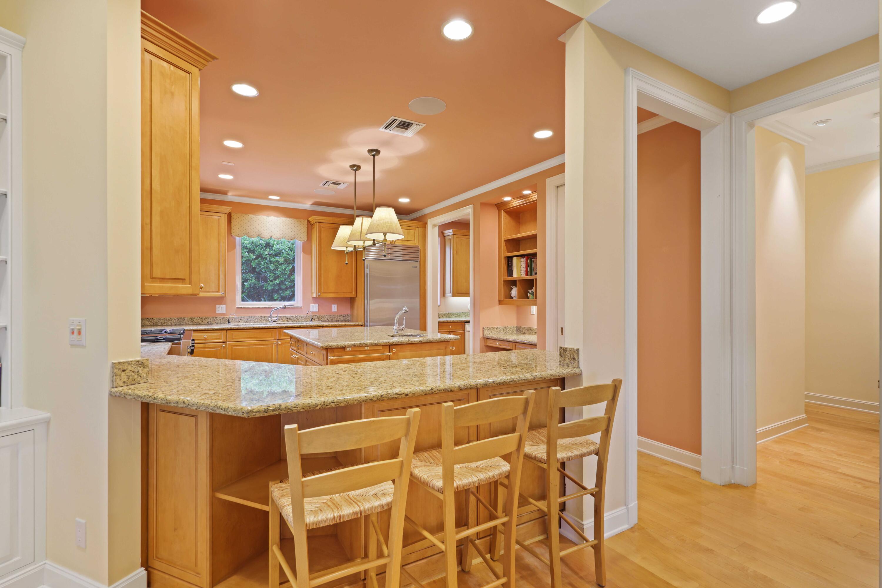 5 Country Road East, Unit A Boynton Beach, FL 33436 - Photo 17 of 51 a bathroom with a granite countertop sink and a mirror