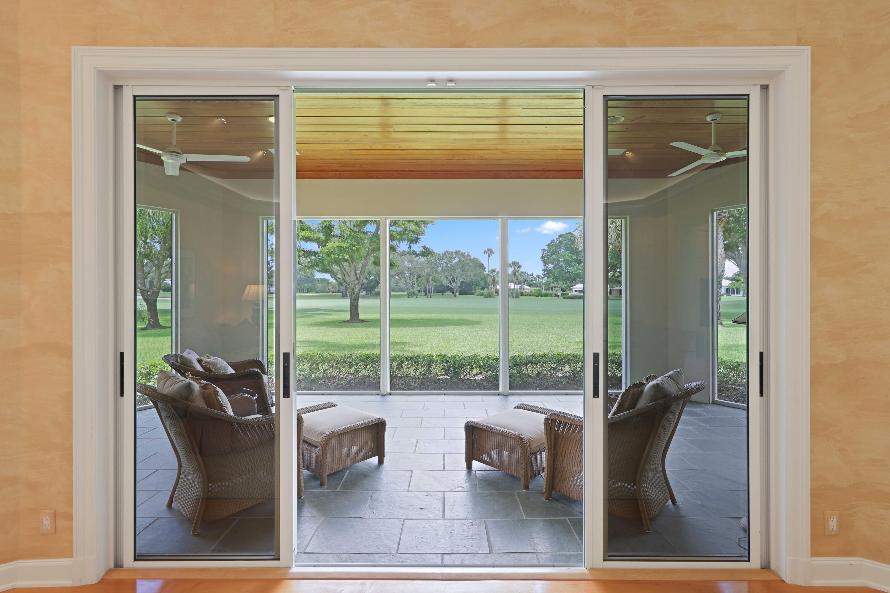 5 Country Road East, Unit A Boynton Beach, FL 33436 - Photo 41 of 51 swimming pool view from a dining room