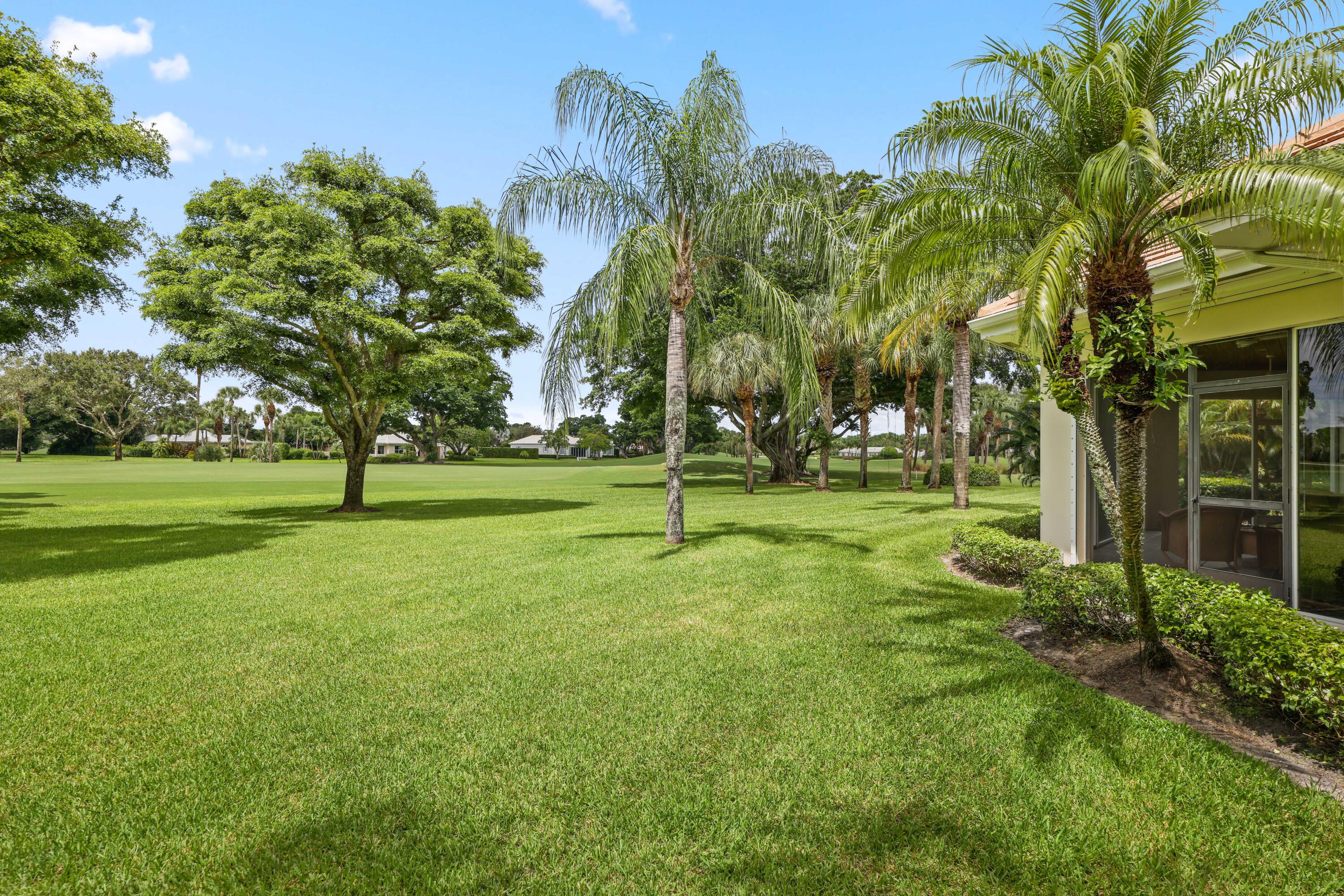 5 Country Road East, Unit A Boynton Beach, FL 33436 - Photo 50 of 51 a view of a park with large trees