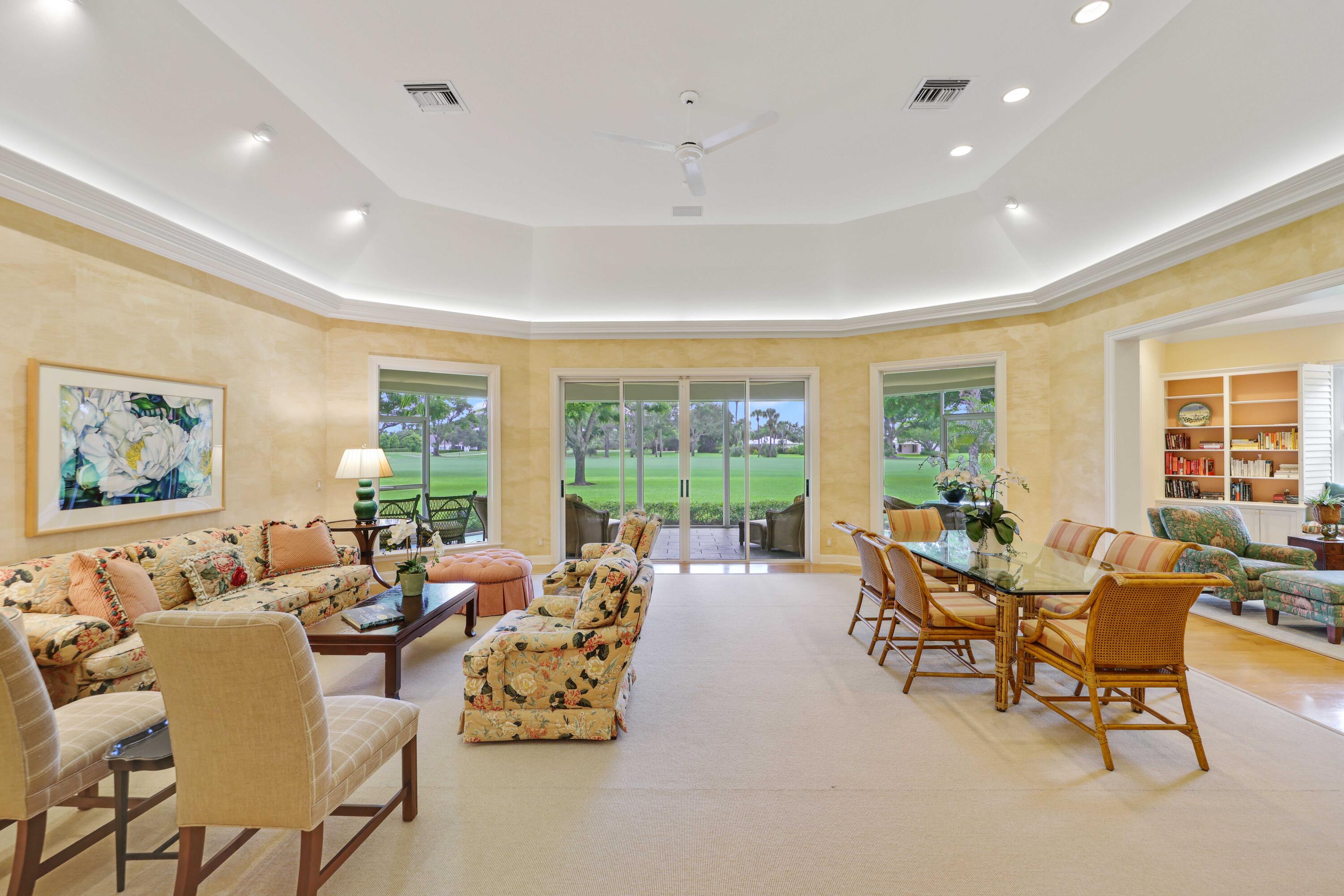 5 Country Road East, Unit A Boynton Beach, FL 33436 - Photo 7 of 51 a living room with furniture and a large window