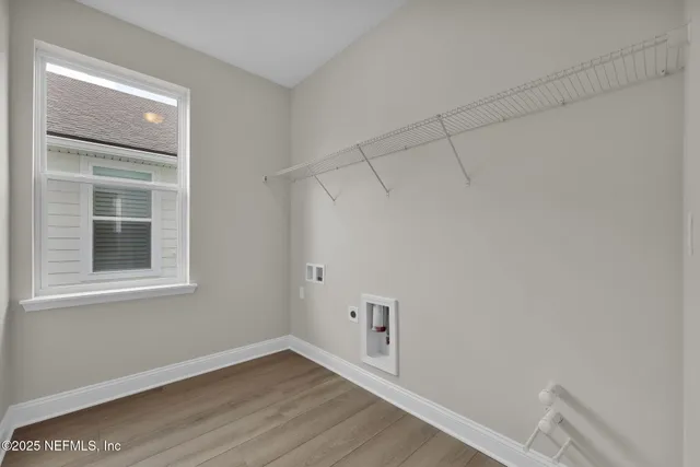 a view of a room that has a window in it