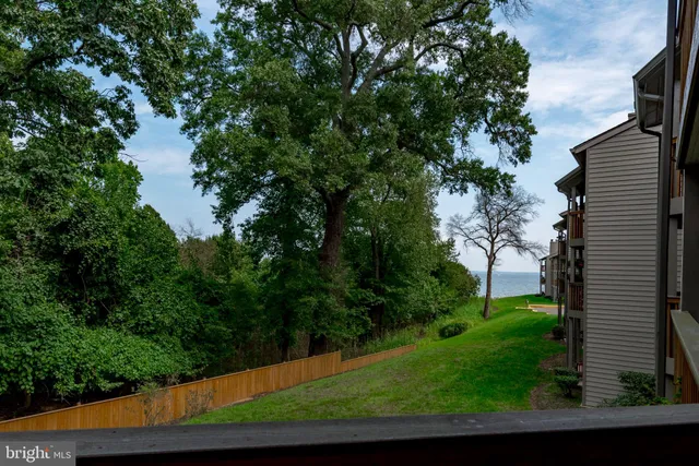 a view of a street view from a balcony