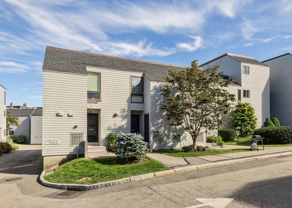 31 Constitution Way, Unit 31 Marblehead, MA 01945 - Photo 2 of 30 front view of a house with a yard