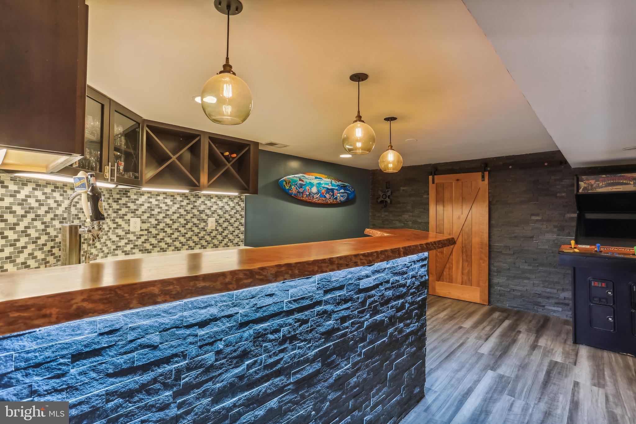 14900 Running Ridge Lane Silver Spring, MD 20906 - Photo 55 of 77 Media Game Room with a wet bar