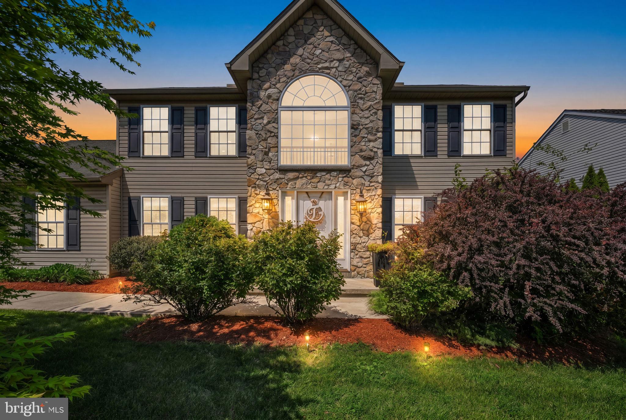 510 Martins Road Reading, PA 19608 - Photo 2 of 52 Elegant stone-front home at dusk.