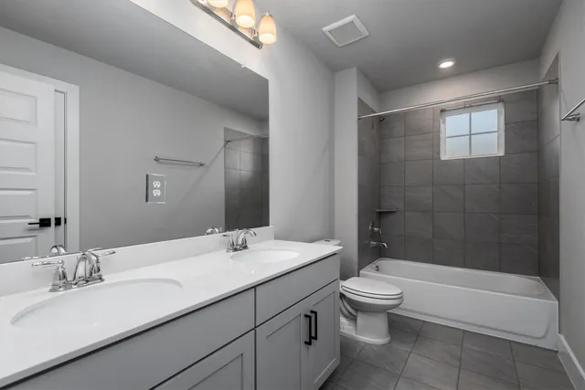 a view of storage and utility room with washer and dryer