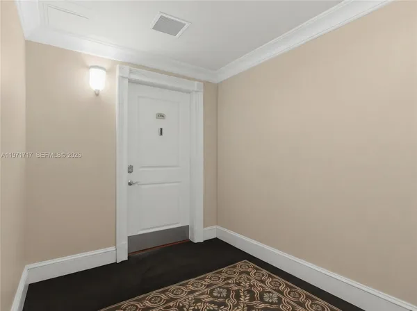 a room with a table and a mirror