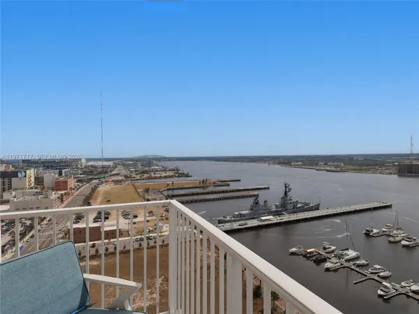 a view of a balcony with city view