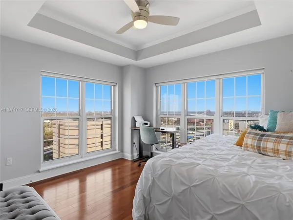 a view of a building with potted plants