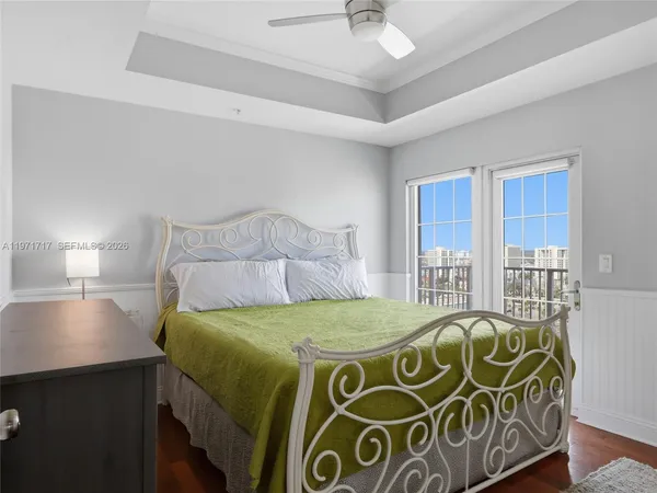 a living room with furniture a fireplace and a table